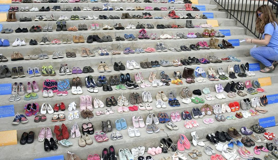 Steppin’ Up For Kids displays over 400 shoes near Historic Courthouse